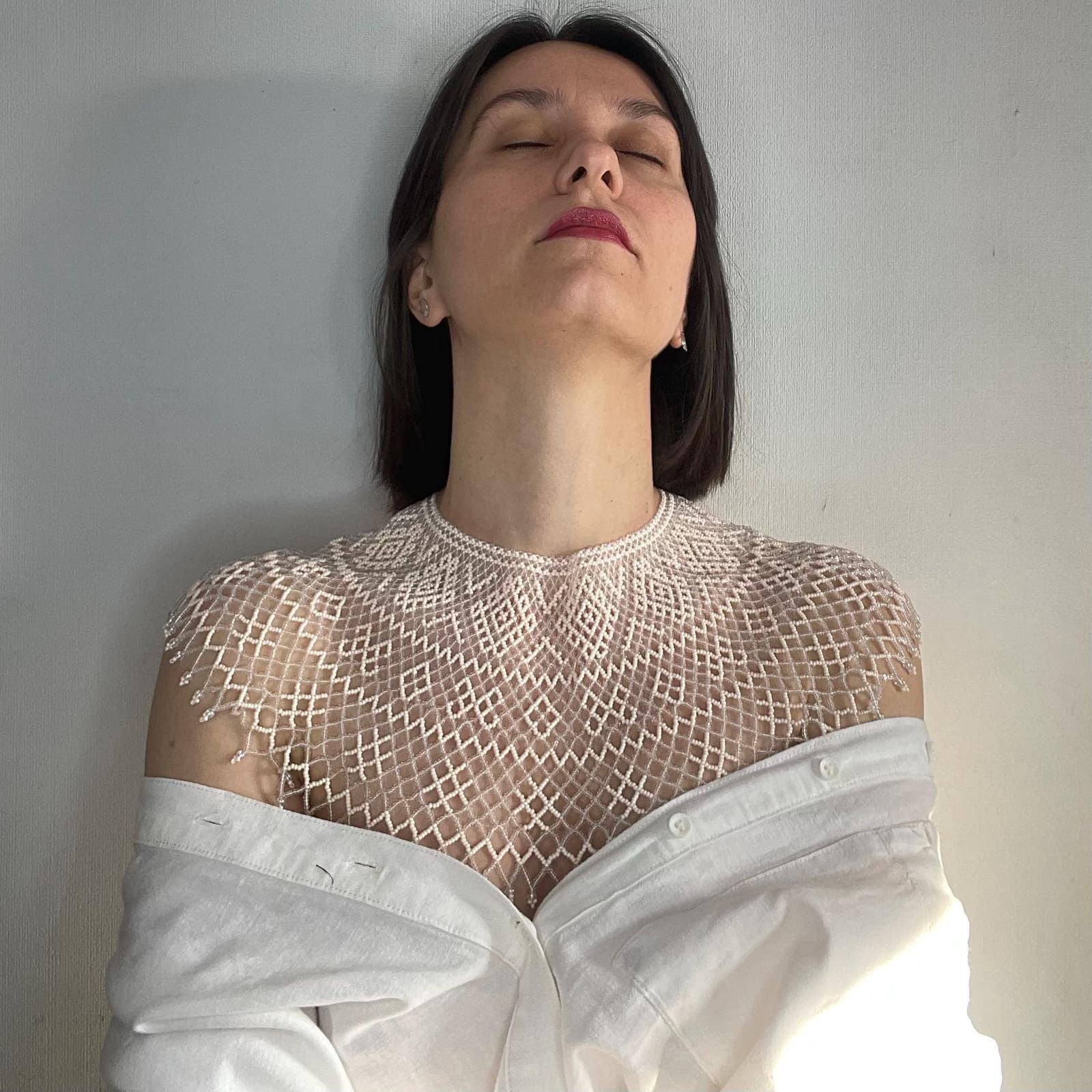 Wide white beaded collar necklace in transparent and pearl glass beads
