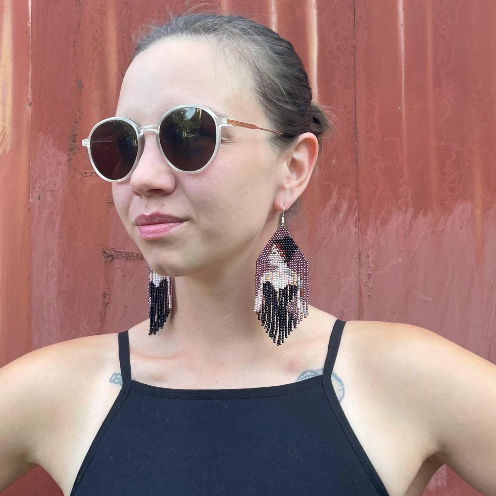 Beaded fringe earrings woven with a detailed portrait design