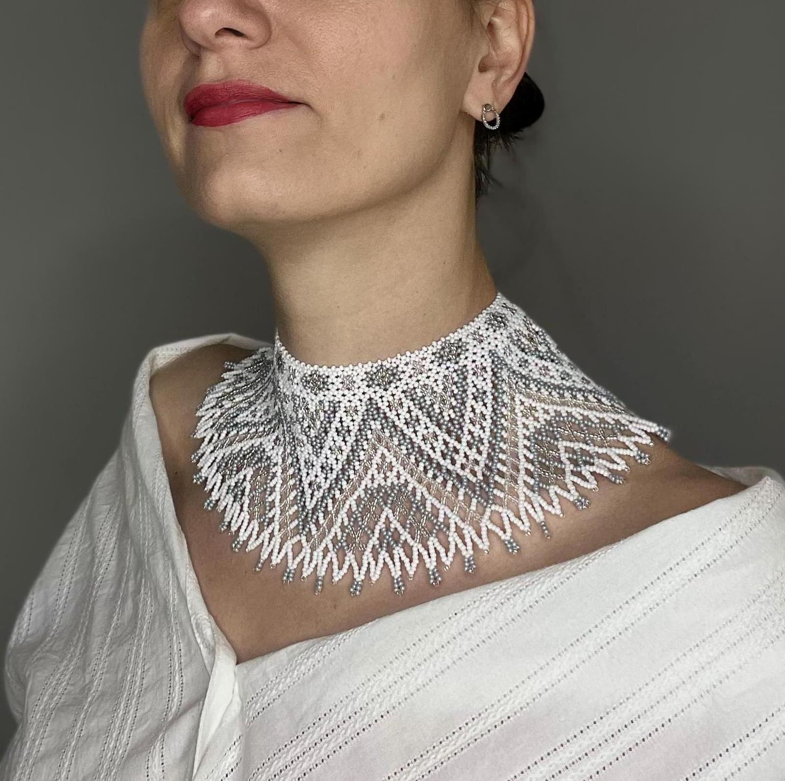 Wide white openwork beaded collar in white, transparent and grey