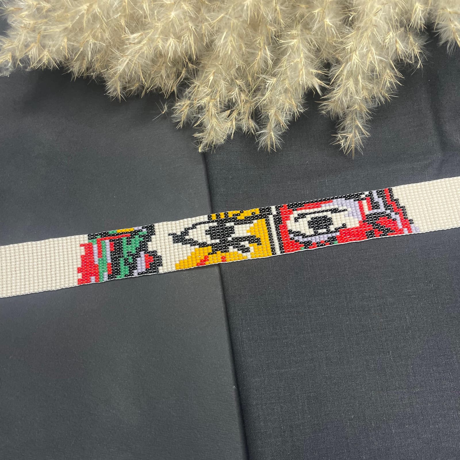 Close detail of the cubist beadwork